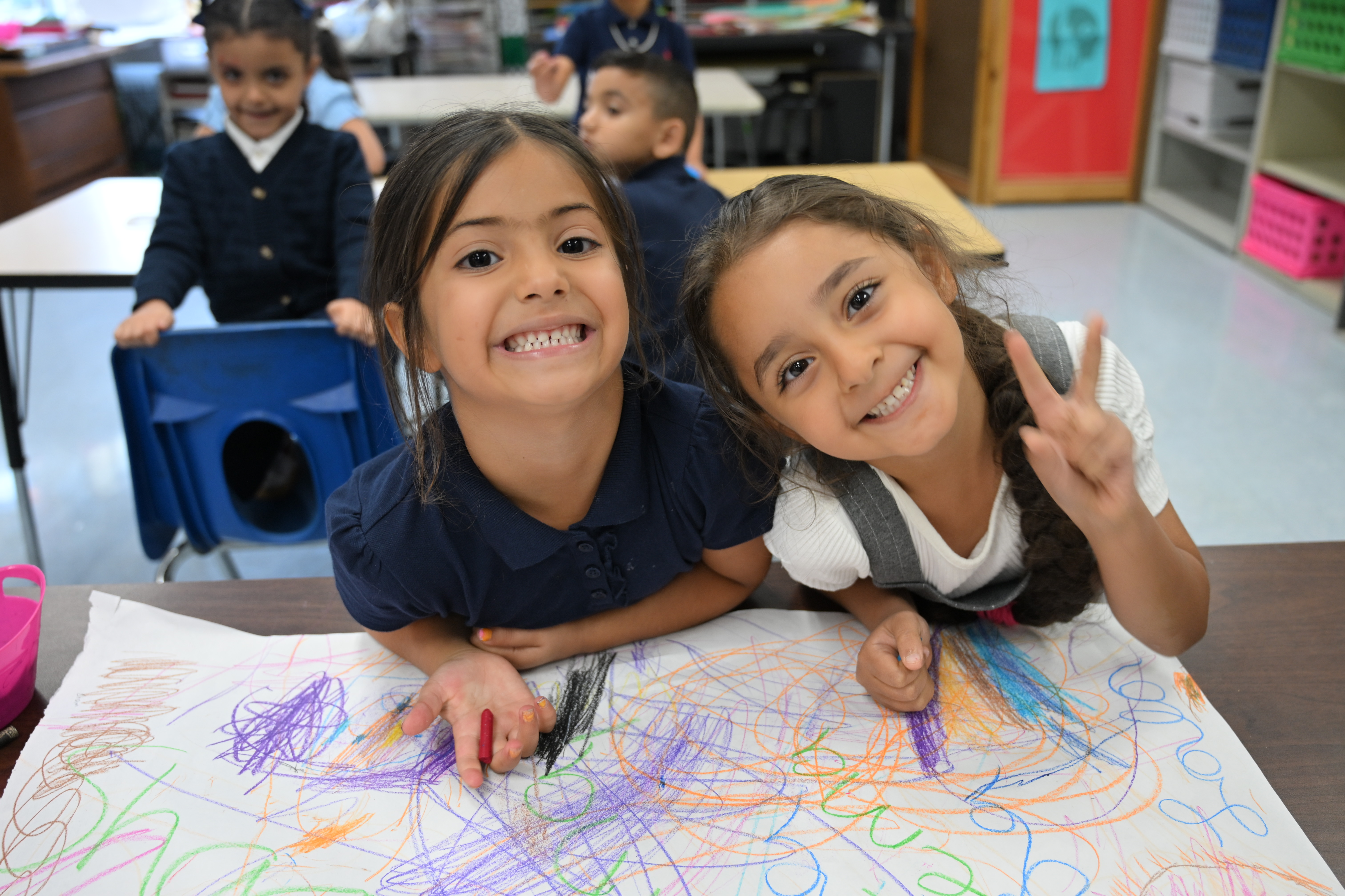 Central Academy students drawing in class